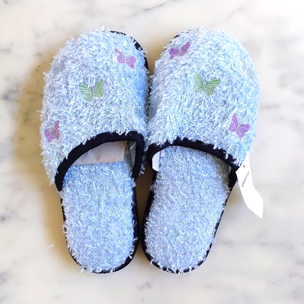 NWT. Limited Too Blue Fluffy Slipper with multi color embroidered butterflies.